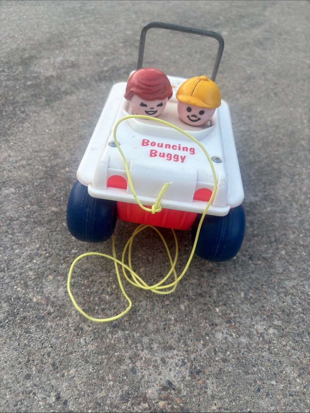Vintage 1973 Fisher PriceBouncing Buggy Pull Toy - White with Blue & Red Accents